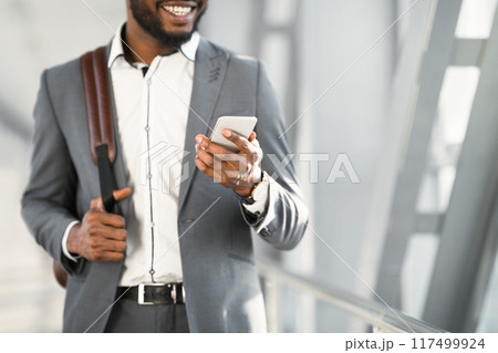 Waiting for Boarding. Businessman Using Phone in Airport Terminal, Crop, Free Space 117499924