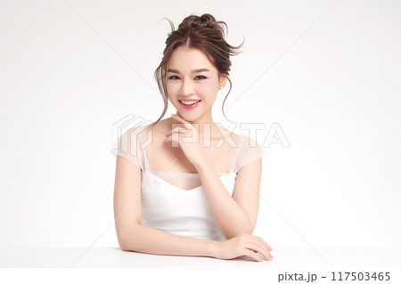 Beautiful young asian woman with clean fresh skin on white background, Face care, Facial treatment, Cosmetology, beauty and spa, Asian women portrait. Beautiful young asian woman with clean fresh skin on white background, Face care, Facial treatment, Cosmetology, beauty and spa, Asian women portrait. 117503465