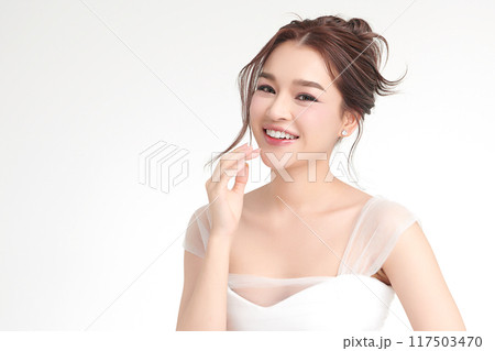 Beautiful young asian woman with clean fresh skin on white background, Face care, Facial treatment, Cosmetology, beauty and spa, Asian women portrait. 117503470