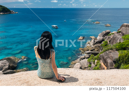 Asian woman at top viewpoint of Similan island, Phang Nga 117504100