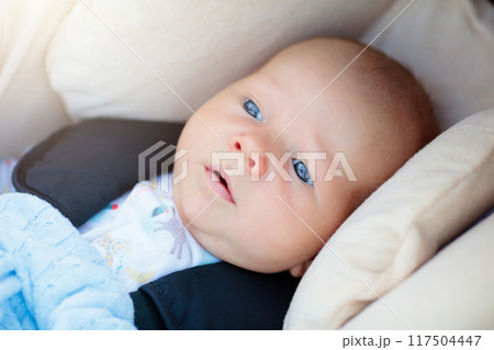 Newborn baby in car seat Newborn baby in car seat 117504447