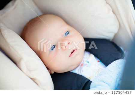 Newborn baby in car seat 117504457