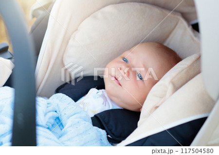 Newborn baby in car seat 117504580