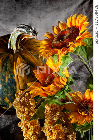 still life with pumpkin and sunflowers 117509426