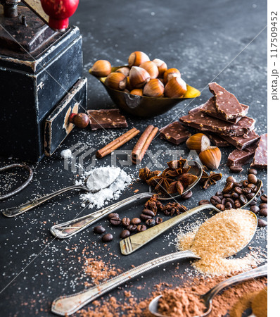 Sweet spices and chocolate on a table 117509452
