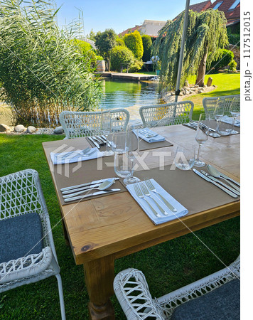 Table at a wedding garden party, Modra, Slovakia Table at a wedding garden party, Modra, Slovakia 117512015