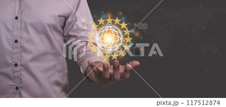 Young man hand holding globe virtual connect via wireless internet in a world of digital technology 117512874