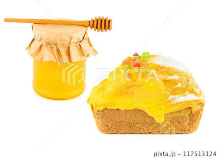Honey cake and jar of honey isolated on white. Collage. 117513124