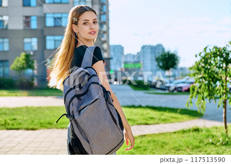 Outdoor portrait young teenager student female with backpack Outdoor portrait young teenager student female with backpack 117513590