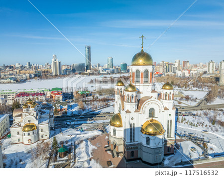 Winter Yekaterinburg and Temple on Blood in beautiful cloudy sunset. Aerial view of Yekaterinburg, Russia. Translation of the text on the temple 117516532