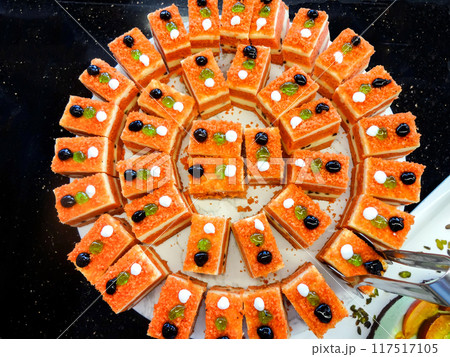 Fresh Cakes on a Large Plate Fresh Cakes on a Large Plate 117517105