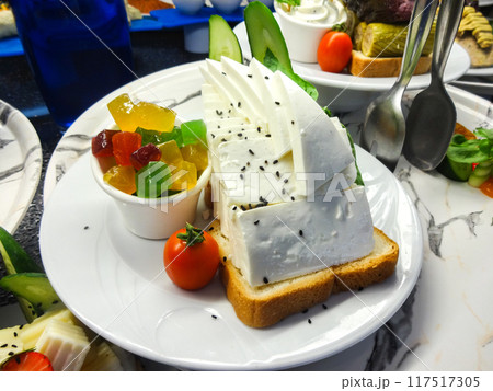 Soft White Cheese with Vegetables and Bread 117517305