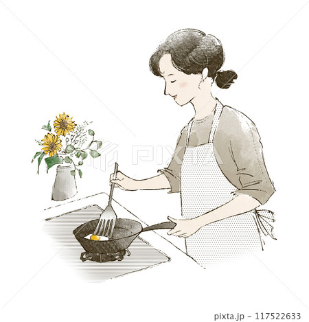 料理をするエプロン姿の女性 117522633