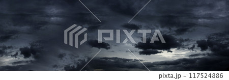 Banner Dramatic dark storm clouds black sky background. Dark thunderstorm clouds rainny season. Panorama Meteorology danger windstorm disasters climate. Dark cloudscape storm cloud with copy space. 117524886