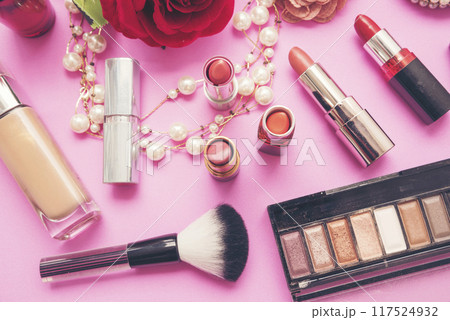 Flatlay Makeup Cosmetics set fashion professional skincare products. Top view cosmetics skincare treatment colorful makeup, lipstick, brush, beauty set. professional beauty makeup set for women 117524932