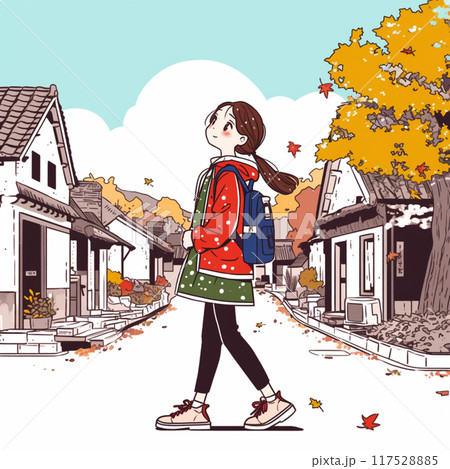 秋の街を歩く女性 117528885