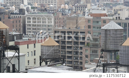 New York City Manhattan cityscape. Rooftop water towers, residential district buildings roof tanks. New York City Manhattan cityscape. Rooftop water towers, residential district buildings roof tanks. 117530712