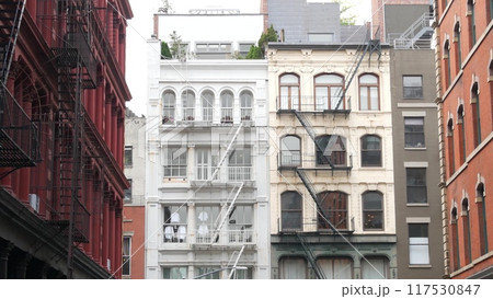 New York City Manhattan Soho fashion district near Broadway street. USA urban building architecture. 117530847