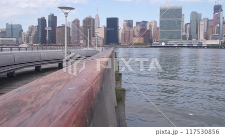 New York City waterfront skyline, Manhattan Midtown riverfront skyscrapers. Cityscape from Queens. 117530856