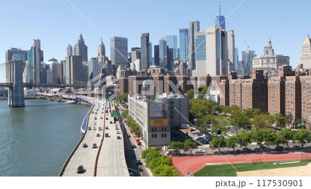 Brooklyn Bridge from Manhattan Bridge. New York City downtown skyline, financial district cityscape. 117530901