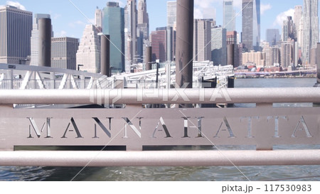 New York City Manhattan downtown skyline, financial district cityscape. Brooklyn Bridge Dumbo pier. New York City Manhattan downtown skyline, financial district cityscape. Brooklyn Bridge Dumbo pier. 117530983