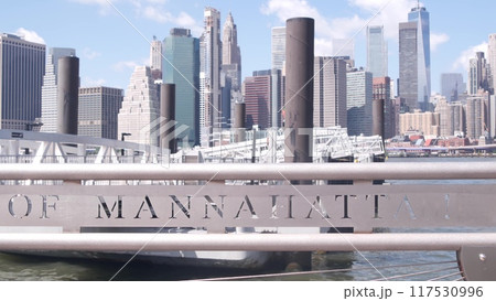New York City Manhattan downtown skyline, financial district cityscape. Brooklyn Bridge Dumbo pier. New York City Manhattan downtown skyline, financial district cityscape. Brooklyn Bridge Dumbo pier. 117530996