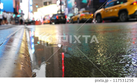 New York City Times Square, Manhattan Midtown Broadway street, USA. Wet road on rainy day, traffic. 117531250