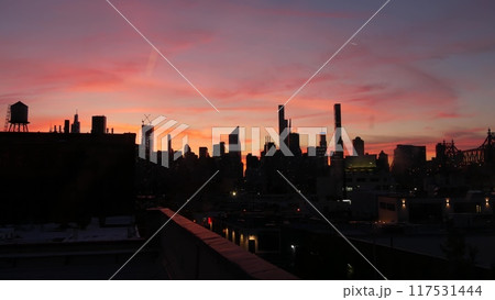 New York City Manhattan skyline cityscape. Rooftop in Queens, Midtown, Queensboro Bridge. Sunset sky 117531444