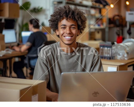 Online business. Young man business owner about online business. Successful and happy with the business Online business. Young man business owner about online business. Successful and happy with the business 117533636