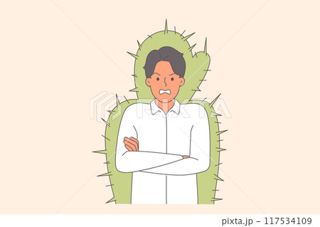 Nervous man experiences aggression and rage due to bad mood, stands in cactus cocoon Nervous man experiences aggression and rage due to bad mood, stands in cactus cocoon 117534109