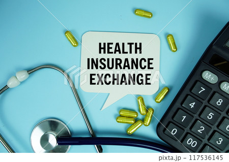 Health Insurance Exchange text with calculator, stethoscope and capsule medicine on blue background, Healthy and wellness concept 117536145