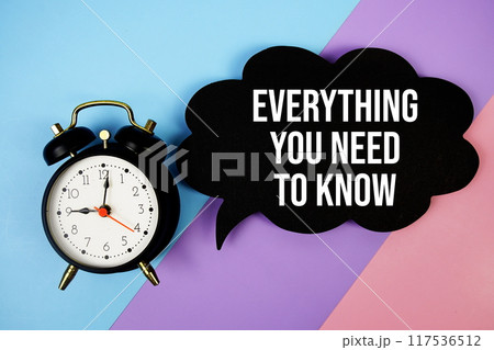 Everything You Need To Know text on speech bubble with alarm clock top view on blue, purple and pink geometric background 117536512