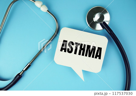 Asthma text on speech bubble with stethoscope top view on blue background Asthma text on speech bubble with stethoscope top view on blue background 117537030