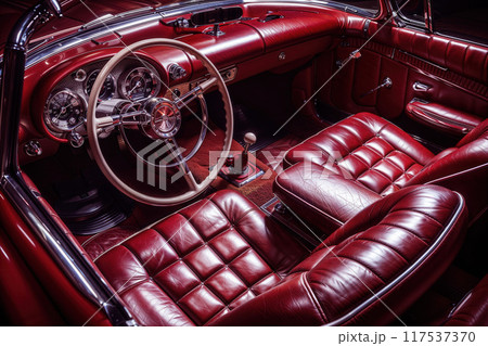 Detail of maroon leather interior old car steering wheel speedometer 117537370