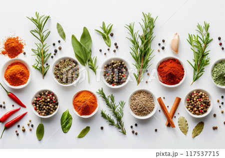 Food and drink healthy lifestyle concept: Italian herbs and spices. Rosemary, tomatoes, garlic and peppers. Top view. Isolated on white 117537715