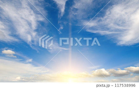 Blue sky with clouds and bright sun. Wide photo. Blue sky with clouds and bright sun. Wide photo. 117538996