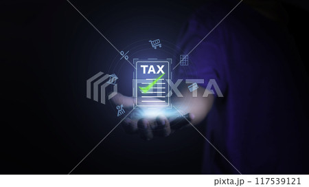 income tax. Businessman pointing to tax icon. income tax system icon around. pay online income tax. futuristic virtual screen interface technology.Money saving ideas in the age of virtual technology.. 117539121