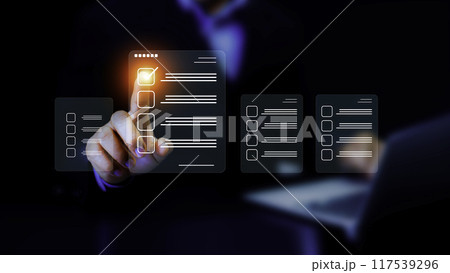 Checklist Online Documentation data Management. Businessman using digital check sheet and checklist mark on document online. productivity checklist and filling survey form online.. 117539296