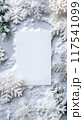 Blank white card surrounded by snowflakes on gray background, perfect for winter holiday invitations 117541099