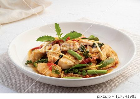 Spicy Stir Fried Chicken breast with chili and fingerroot in white plate.(Pad Cha) Spicy Stir Fried Chicken breast with chili and fingerroot in white plate.(Pad Cha) 117541983