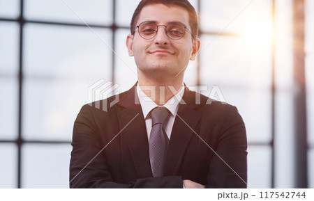 Handsome business CEO executive business man with crossed arms 117542744