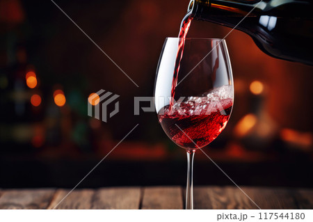 Fine Wine Pouring into Glass Fine Wine Pouring into Glass 117544180