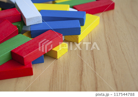Multicolored wooden blocks with customizable space for text or ideas. Toys and copy space concept. 117544788