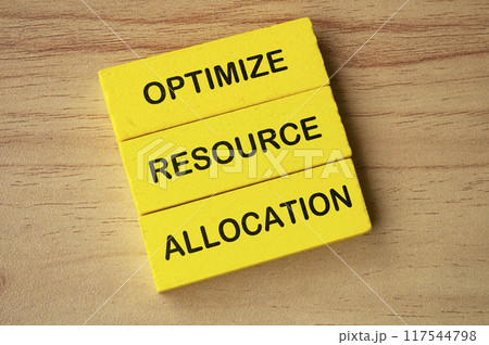 Top view of Optimize Resource Allocation text on yellow wooden blocks. Business improvement concept. 117544798