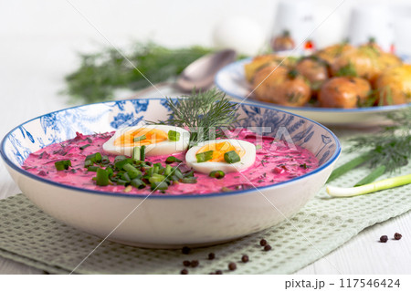 Cold beetroot soup (borscht) with boiled egg. Cold beetroot soup (borscht) with boiled egg. 117546424