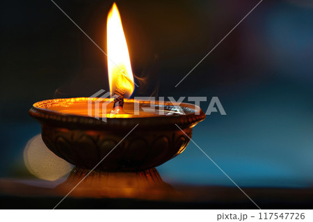 Beautiful greeting card with bright holiday composition for happy and celebrate Diwali 117547726