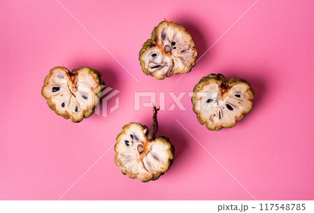 Custard apple on pink background Custard apple on pink background 117548785