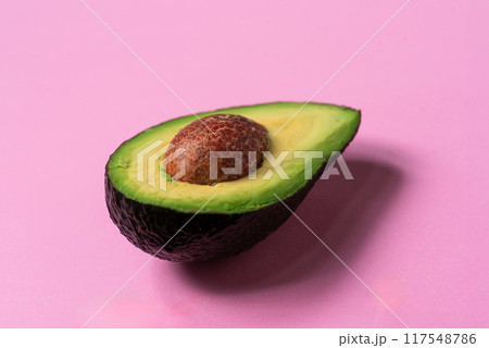 Avocado on a pink background Avocado on a pink background 117548786