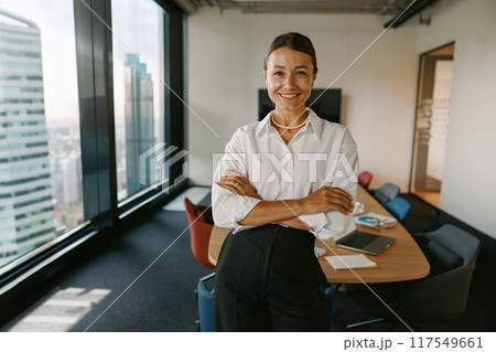 Confident and skilled professional thriving in a modern office environment and setting 117549661