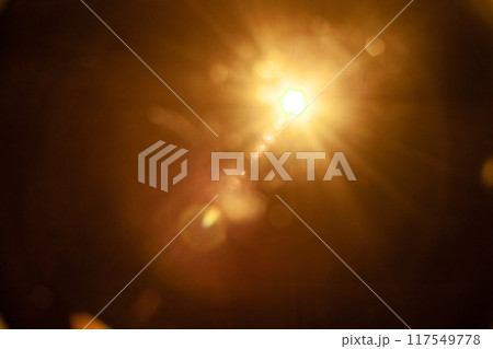 Sun flare on the black background 117549778